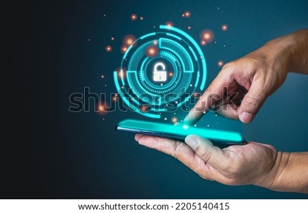 People's fingers are pressing on the phone screen. Represents protection against external hacks, code protection security concepts, viruses, firmware and malware.