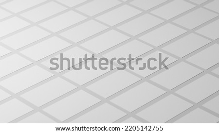Mock up of business cards next to each other. Blank image. Gray texture of rectangles forming a grid. Resource for graphic design, image with top glow forming gradient. Backdrop, background.