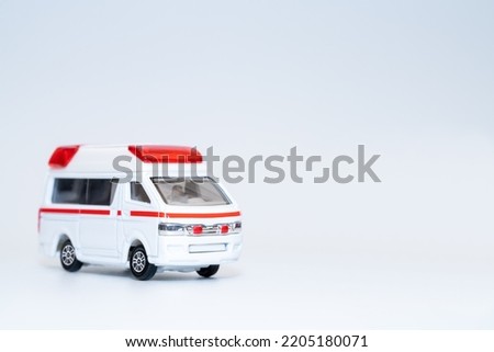 Toy ambulance on white background.