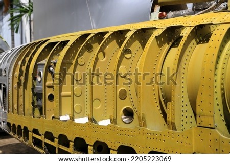 airplane airframe or fuselage without panels installed, The layout of the airplane structural. Royalty-Free Stock Photo #2205223069