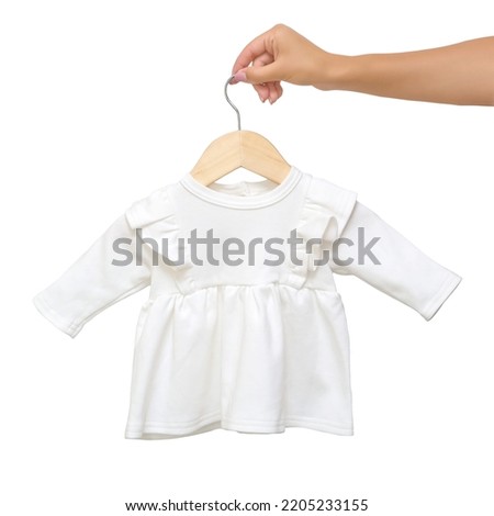 Isolated photo of white baby dress with long sleeves for creating baby mockup for presentation own onesie pattern design on the websites and marketplaces