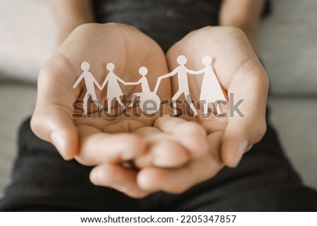 Hands holding diversity family, happpy carer and volunteer, disable nursing home, rehabilitation and health insurance concept
 Royalty-Free Stock Photo #2205347857