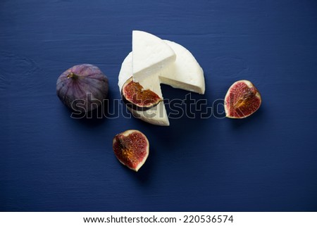 Cheese and ripe figs, horizontal shot, high angle view