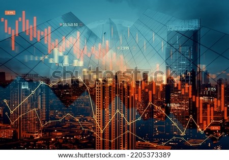 Economic crisis concept shown by declining graphs and digital indicators overlap modernistic city background. Double exposure. Royalty-Free Stock Photo #2205373389