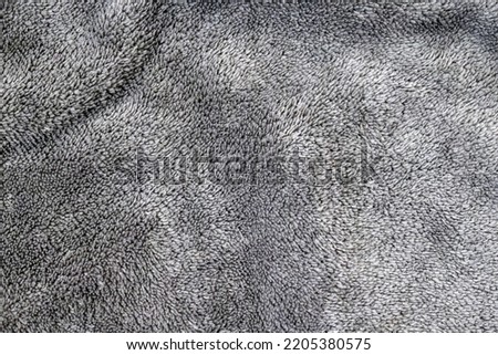 seamless texture background of gray curly wool