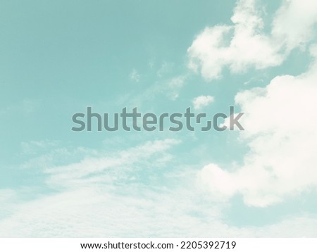 a beautiful clouded green sky background. Royalty-Free Stock Photo #2205392719
