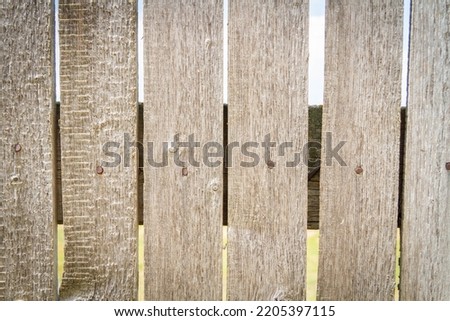 Texture of wooden boards. Place for label. Old board. Deep cracks. Background of wood.