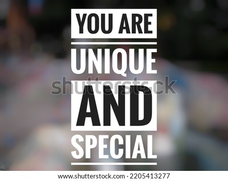 Motivational quote "You are unique and special" on colorful abstract background.