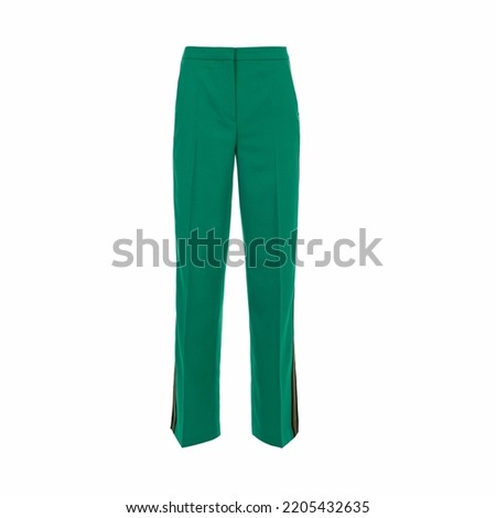 Women's green trousers with wider legs Royalty-Free Stock Photo #2205432635