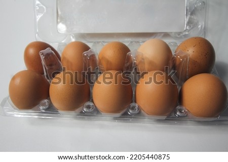 eggs in plastic packaging on a white background