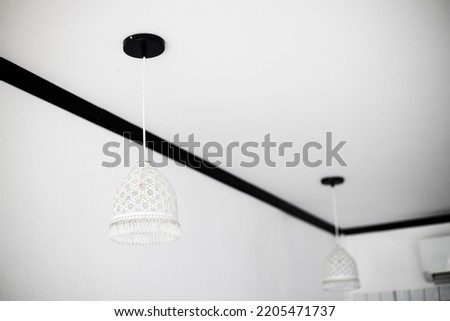 Beautiful hanged white decorative light bulbs in the coffee shop. Set  modern lamp on blur background. Quality picture. Concept idea.