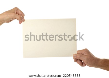 Hands holding blank paper on a white background