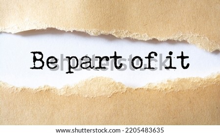 Torn brown paper revealing the words Be part of it Royalty-Free Stock Photo #2205483635