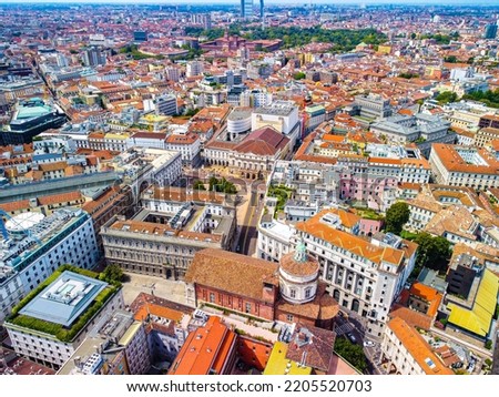 Aerial view of the Old Square with a monument to the artist and inventor Leonardo da Vinci next to the La Scala opera house, the comuna and the Vittorio Emmanuele gallery in Milan Italy 09.2022