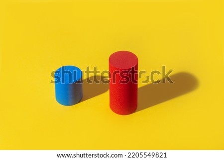 Abstract colored geometric shape red and blue on yellow background. Minimal geometric shapes