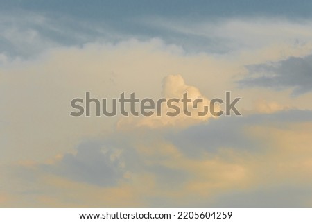 Sunset sky orange yellow clouds background nature in the evening.