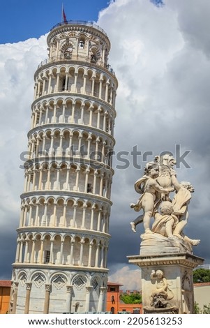 Leaning Tower of Pisa at dramatic sky, Tuscany, Italy