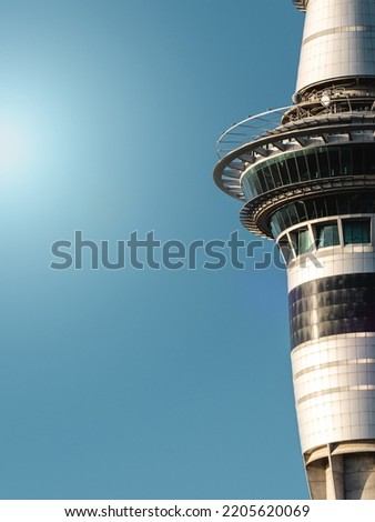 Auckland sky tower close up caption on a sunny day. Vertical photo. New Zealand iconic tower