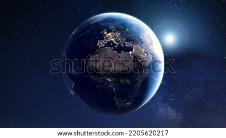 Planet Earth viewed from space with city lights. Technology, global communication, world connections. Satellite view. Elements from NASA. Royalty-Free Stock Photo #2205620217