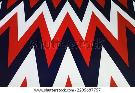 Zig zag red and navy blue patterns background Royalty-Free Stock Photo #2205687757