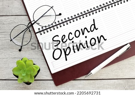 Second Opinion - An opinion on an issue disputed by two or more parties, a text concept with points on a daybook. Royalty-Free Stock Photo #2205692731
