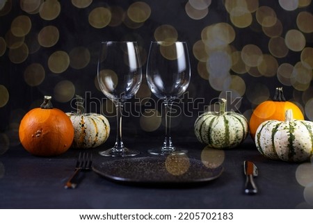 Pumpkin on a dark background. Pumpkins. bokeh. Thanksgiving Day. Dinner. Banner. copy space