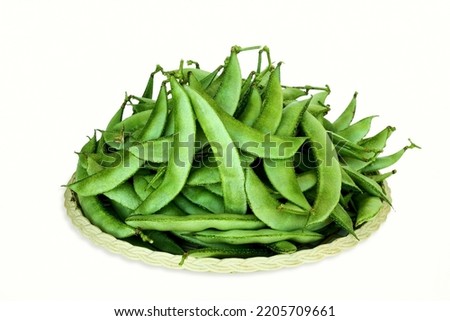 garden fresh indian vegetable valor beans or hyacinth beans also known in india as papdi beans.surti papdi or vaal beans Royalty-Free Stock Photo #2205709661