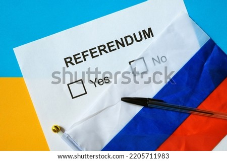Referendum ballot paper, Russian flag and pen on table in Ukraine, top view. Concept of referendum on joining Russia, war in Ukraine, voting in Donetsk, Luhansk, Kherson and Zaporizhzhia regions. Royalty-Free Stock Photo #2205711983