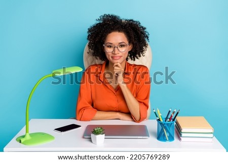 Photo of clever smart worker wear orange shirt spectacles hand arm chin listening you isolated blue color background
