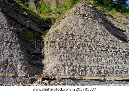 Formation of a stacked layers of rock over million of years