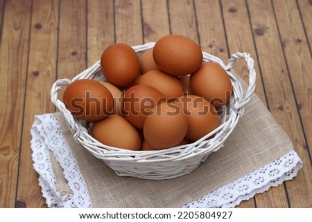 A basket of brown eggs.