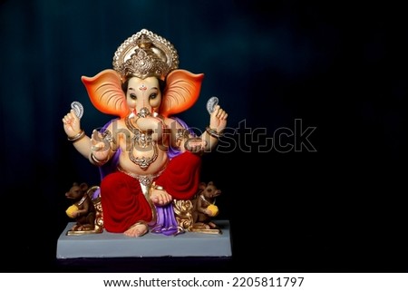  Lord Ganesha Statue. Indoor Photoshoot. beautiful art in festivel. Royalty-Free Stock Photo #2205811797