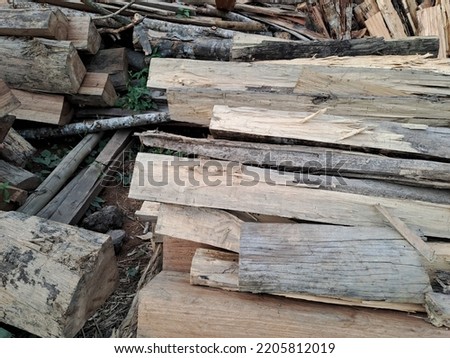 
A large pile of firewood . Trees has been cut and split into firewood to be used as fuel for heating in fireplaces and furnaces in the.
