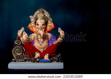  Lord Ganesha Statue. Indoor Photoshoot. beautiful art in festivel. Royalty-Free Stock Photo #2205812089