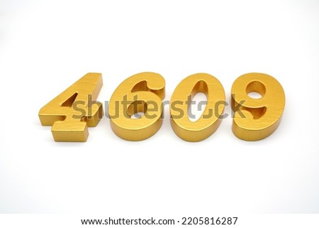    Number 4609 is made of gold-painted teak, 1 centimeter thick, placed on a white background to visualize it in 3D.                                 