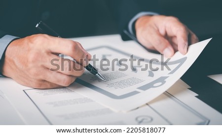 Businessman validates and manages business documents and agreements. , signing a business contract approval of contract documents confirmation or warranty certificate