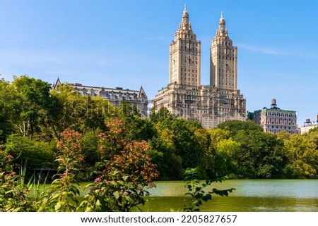 Skyline panorama with Eldorado building and reservoir in Central Park in midtown Manhattan in New York City