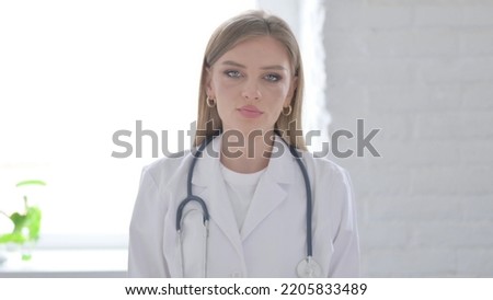 Portrait of Lady Doctor Showing No Sign by Finger, Denial