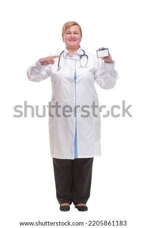 Medical doctor showing business card sign, blank with copy space for text or design