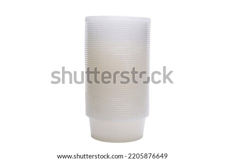 A collection of translucent empty containers and plastic food boxes on a white backdrop.
