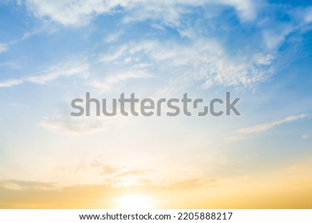 Orange sky and clouds background,Background of colorful sky concept, amazing sunset with twilight sky and clouds