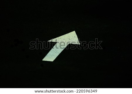 White Arrow on the Road