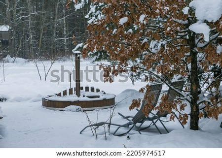 beach chairs on the snow terrace, spa in the snow