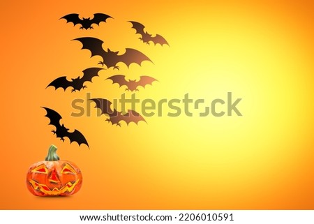 Composition of pumpkins and bats. Happy Halloween