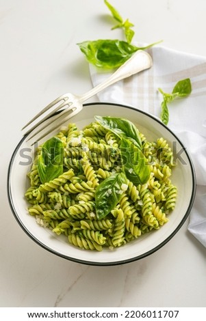 Delicious Pasta With Pesto Souce On The White Plate White Marble Background