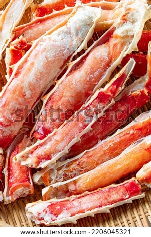 Fresh and delicious king crab dishes Royalty-Free Stock Photo #2206045321