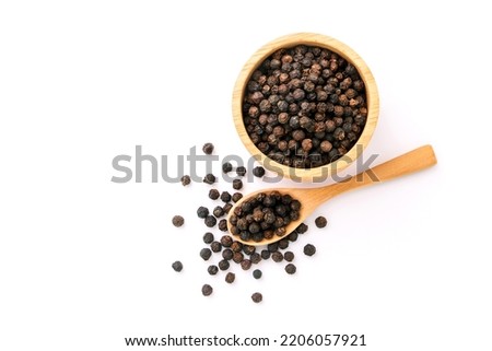 Black pepper or peppercorns in wooden bowl with spoon isolated on white background , top view , flat lay. Royalty-Free Stock Photo #2206057921