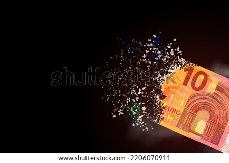 10 euro bills scattered in the air. money inflation concept. the disappearance of banknotes, hyperinflation. financial crash, euro banknotes, high living costs.