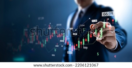 businessman hand touch graph interface Buying shares in the stock market Financial data analysis, timely acquisition, stock acquisition ideas of companies with growing businesses in the future. Royalty-Free Stock Photo #2206121067