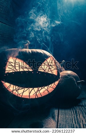 Creepy and strange Halloween pumpkin as Halloween background. Background with copy space for Halloween.